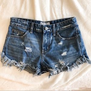 FREE PEOPLE distressed jean shorts